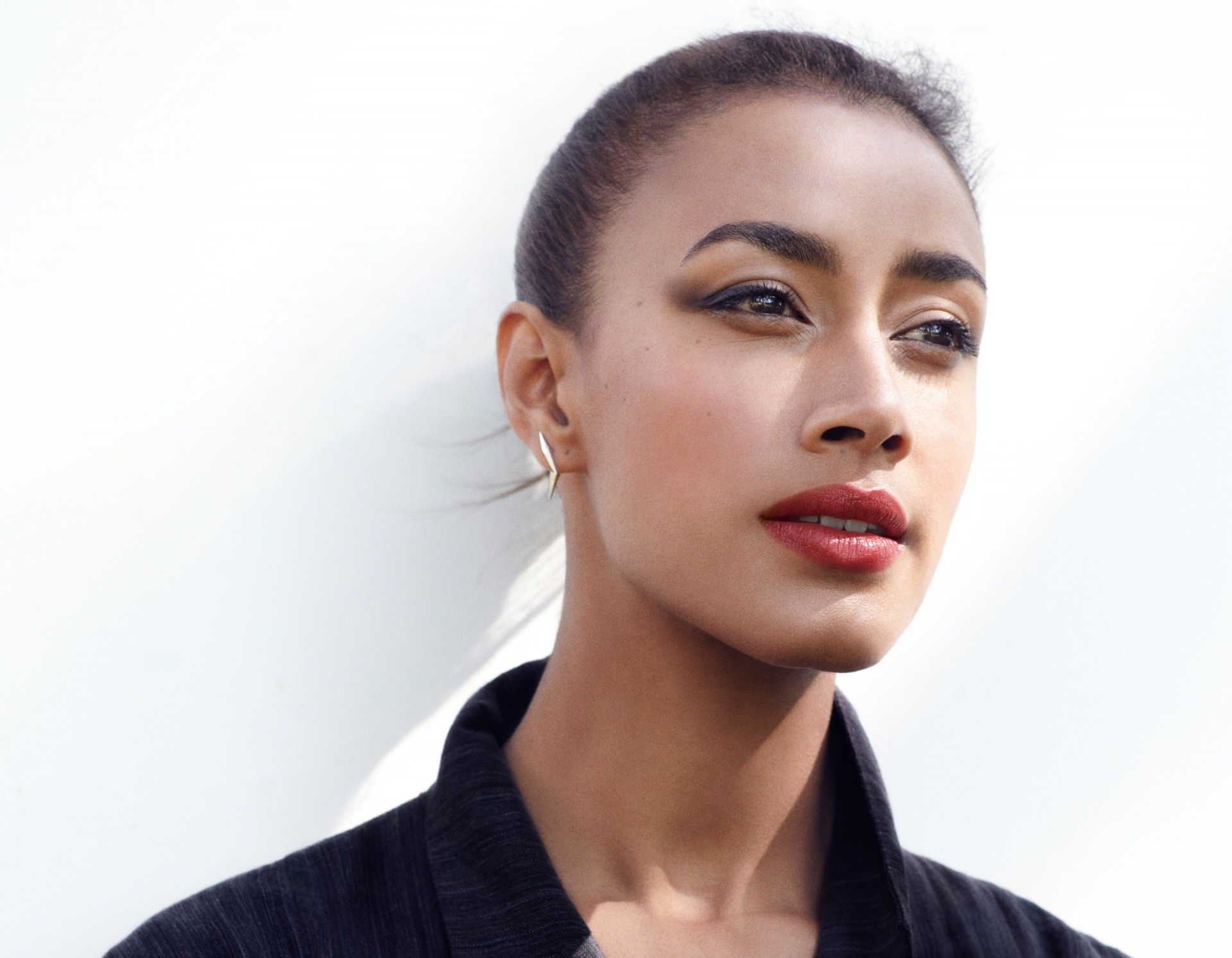 Kjaer Weis classic cat-eye with earthy colors and softer edges