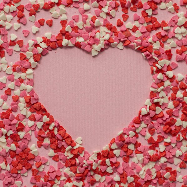 Candies in the Shape of a Heart by Gabby K on Pexels